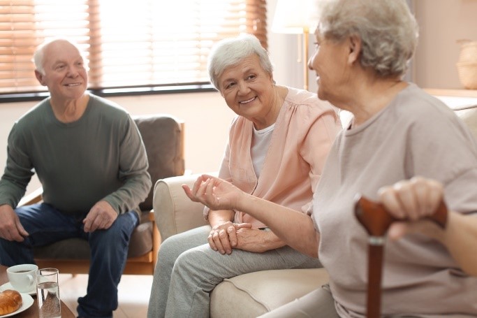 Elderly people have a group conversation