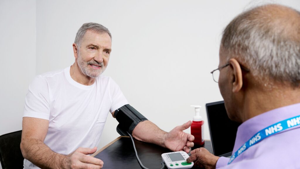 A man getting his blood pressure checked