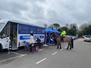 Police horse by wellbeing bus
